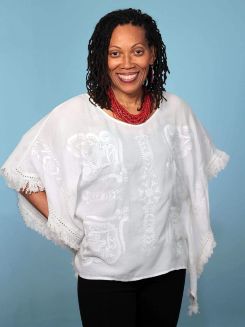 A woman in white shirt and black pants